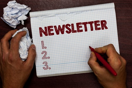 Word writing text newsletter business concept for bulletin periodically sent to subscribed members news report man holding marker notebook page crumpled papers several tries mistakes Stock Photo