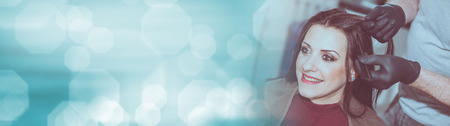 Hairdresser coloring client hair panoramic banner Stock Photo