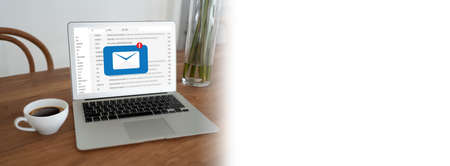 Coffee on the wooden table from above urban coffee shop workspace or coffee break in morning Stock Photo