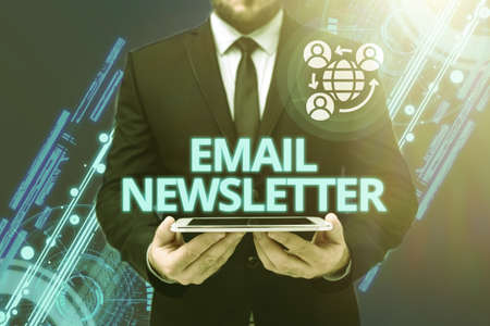 Text sign showing email newsletter word for email sent out to inform the audience of the latest news man in office uniform holding tablet displaying new modern technology