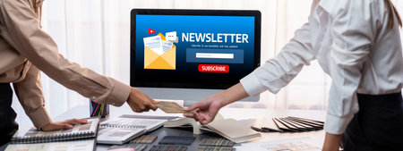 Group of interior architect designer team at table choosing various mood board samples with architecture software on laptop screen modern renovation and interior material selection concept insight