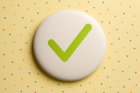 Approved button on a yellow background with polka dots