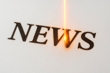The inscription news is burned with a laser space for text