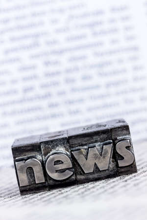The word news written with lead letters symbolic photo for newsletters newspapers and information