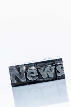 The word news written with lead letters photo icon for newsletters newspapers and information Stock Photo