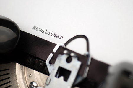 Close up view newsletter written on an old typewriter