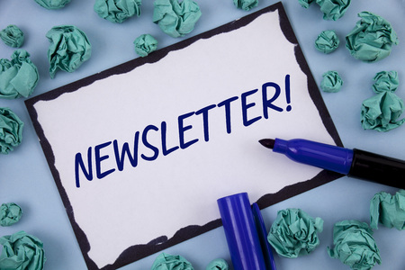 Writing note showing newsletter motivational call business photo showcasing bulletin periodically sent to members of group written sticky note paper within paper balls plain background pen Stock Photo